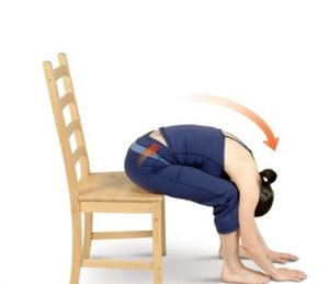 woman showing chair seated forward bend yoga exercise