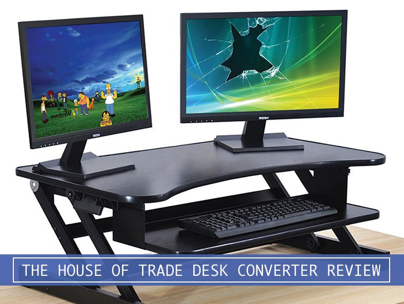two desktop monitors and keyboard with the house of trade standing desk converter