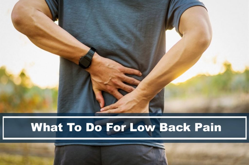 person holding lower back pain